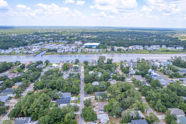 229 NE 34th St, Oak Island, NC 28465 - aerial perspective of suburban area with a large body of water