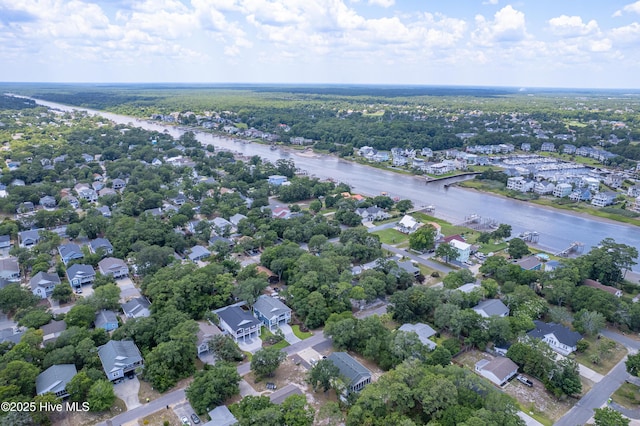 229 NE 34th St, Oak Island, NC 28465 - aerial view of property's location featuring a nearby body of water and nearby suburban area