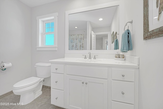 305 Ivy Ln, Carolina Beach, NC 28428 - full bathroom featuring toilet, baseboards, vanity, tile patterned flooring, and curtained shower