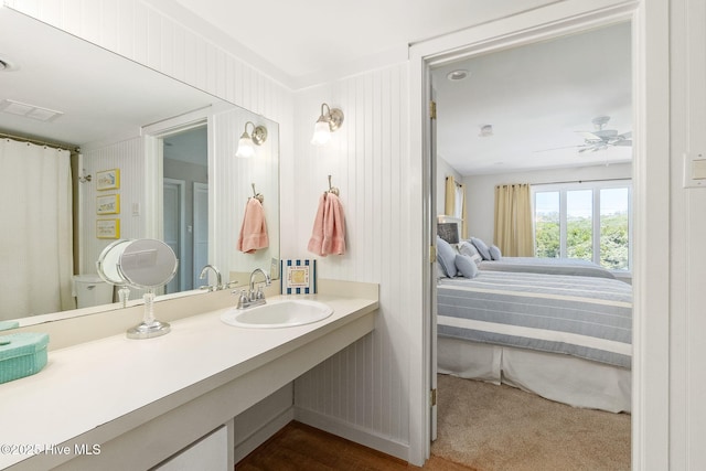 full bathroom with a ceiling fan, visible vents, and vanity