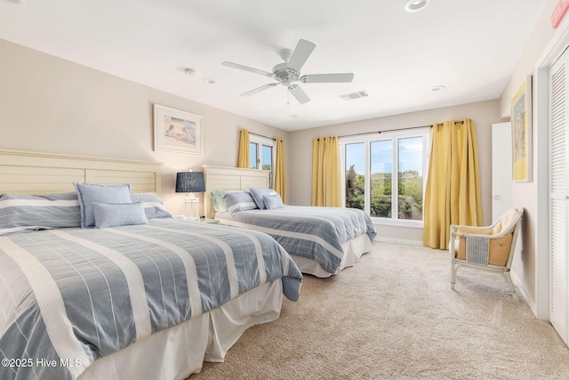 carpeted bedroom with visible vents, recessed lighting, baseboards, and ceiling fan