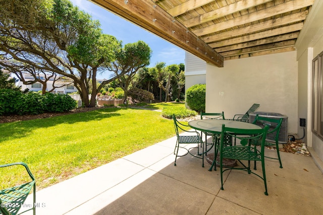 view of patio / terrace with central air condition unit and outdoor dining space