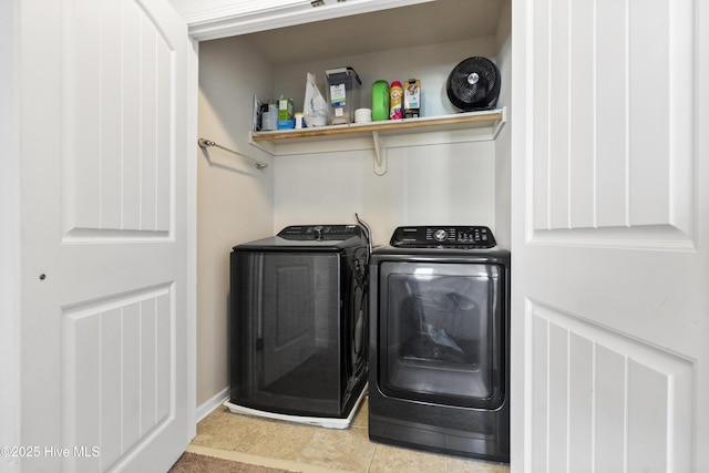 507 Romper Rd, Sneads Ferry, NC 28460 - laundry area featuring laundry area, washer and clothes dryer, baseboards, and tile patterned flooring