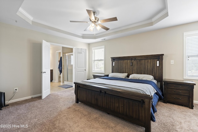 507 Romper Rd, Sneads Ferry, NC 28460 - bedroom with crown molding, baseboards, light carpet, and a tray ceiling