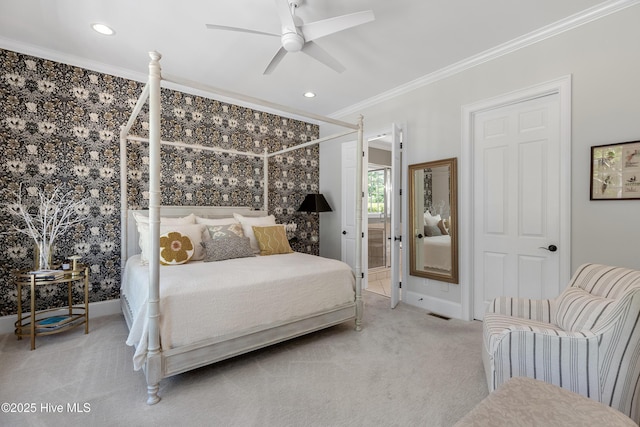 carpeted bedroom with baseboards, ornamental molding, recessed lighting, and ceiling fan