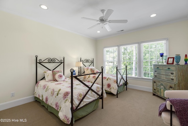 bedroom featuring visible vents, recessed lighting, crown molding, and light colored carpet
