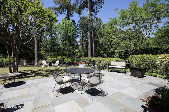 view of patio featuring outdoor dining space