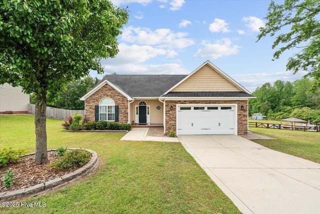 ranch-style home with an attached garage, a front yard, driveway, and stone siding