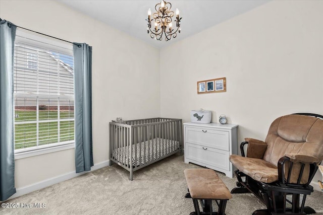 bedroom featuring a chandelier, baseboards, light colored carpet, and multiple windows