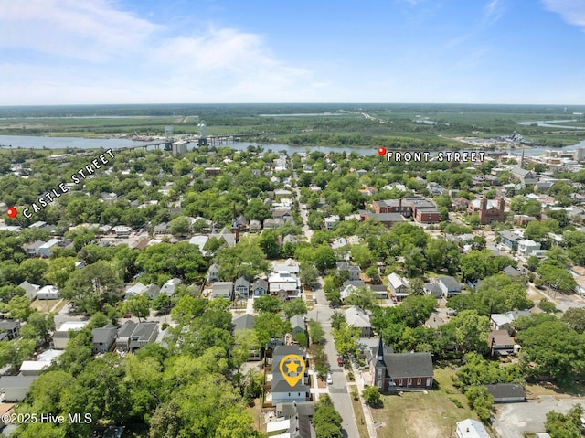 drone / aerial view featuring a water view and a residential view