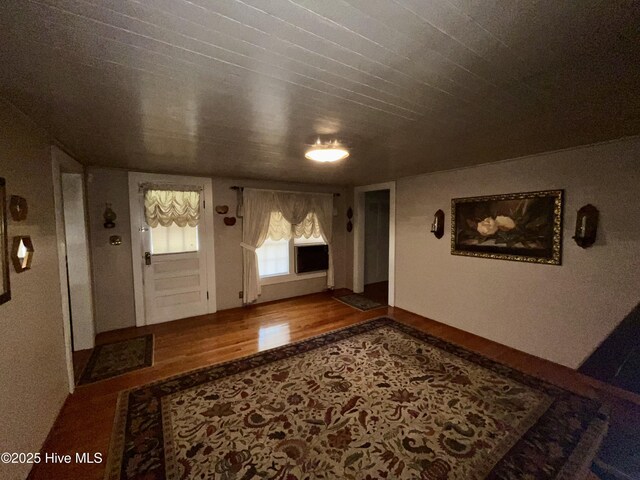 hall with wood finished floors
