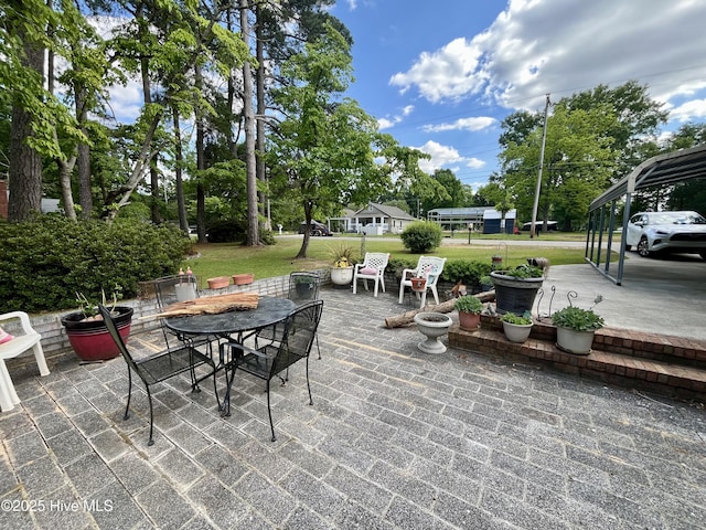 view of patio featuring outdoor dining space