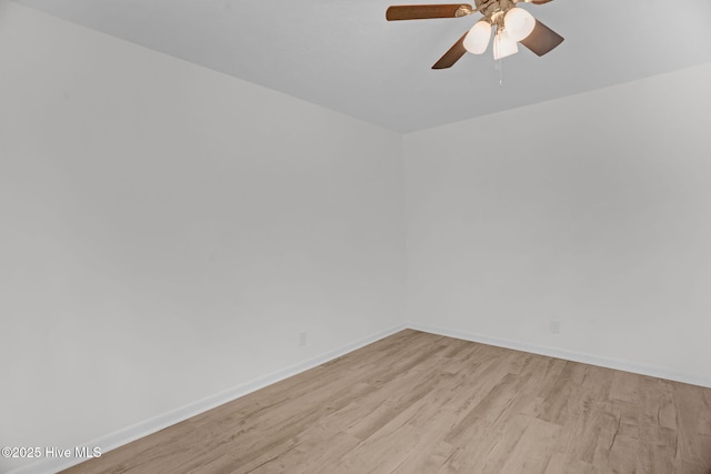 811 Crawford St, Goldsboro, NC 27530 - unfurnished room with a ceiling fan, baseboards, and wood finished floors