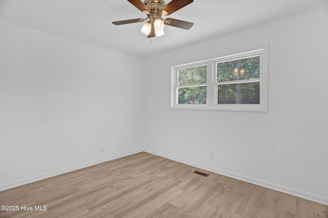 811 Crawford St, Goldsboro, NC 27530 - empty room featuring a ceiling fan, baseboards, visible vents, and light wood-style flooring