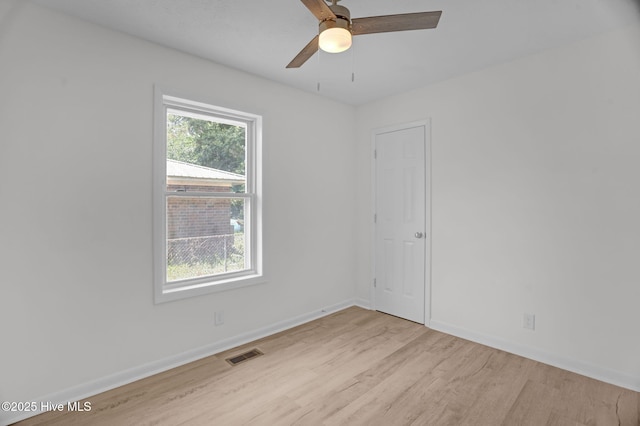 811 Crawford St, Goldsboro, NC 27530 - spare room featuring visible vents, light wood finished floors, ceiling fan, and baseboards