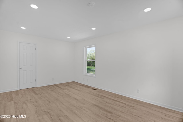 811 Crawford St, Goldsboro, NC 27530 - unfurnished room with visible vents, recessed lighting, baseboards, and wood finished floors