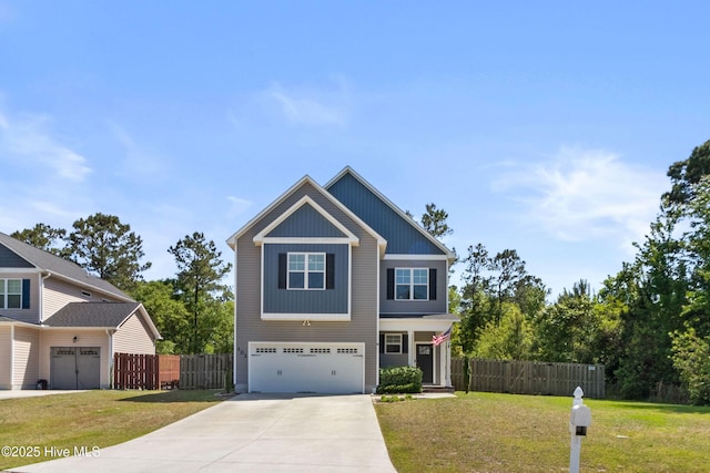 view of front facade featuring an attached garage, a front lawn, fence, and concrete driveway