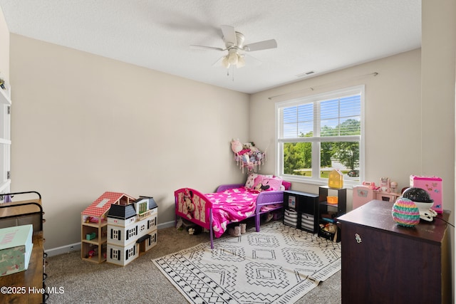 bedroom featuring baseboards, ceiling fan, carpet, and visible vents