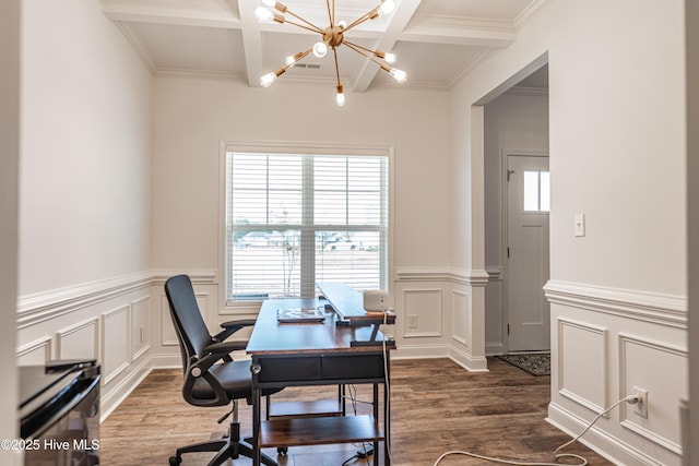 office featuring wood finished floors, a decorative wall, beamed ceiling, coffered ceiling, and a notable chandelier