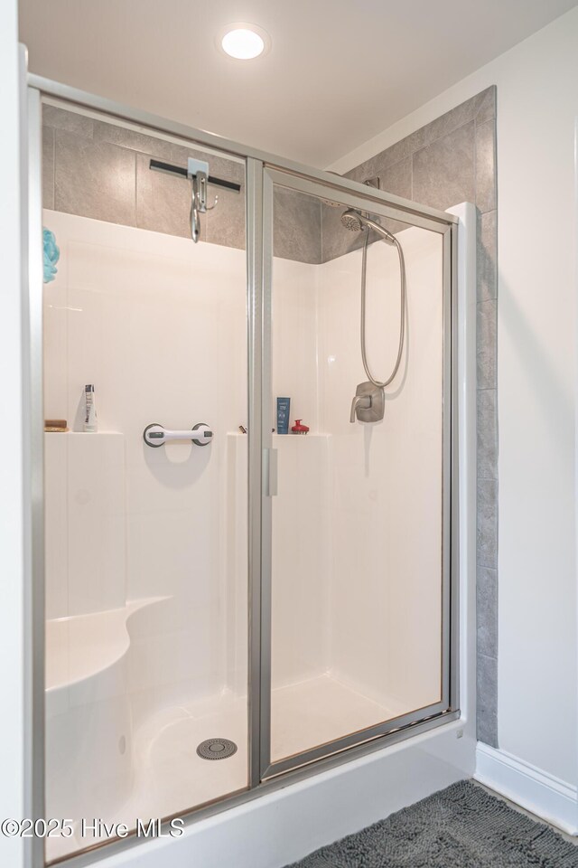 bathroom featuring a stall shower