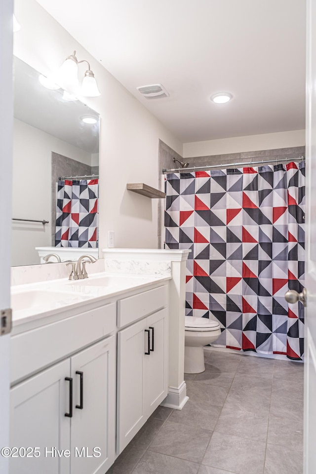 full bath featuring visible vents, tile patterned flooring, vanity, toilet, and a shower with shower curtain