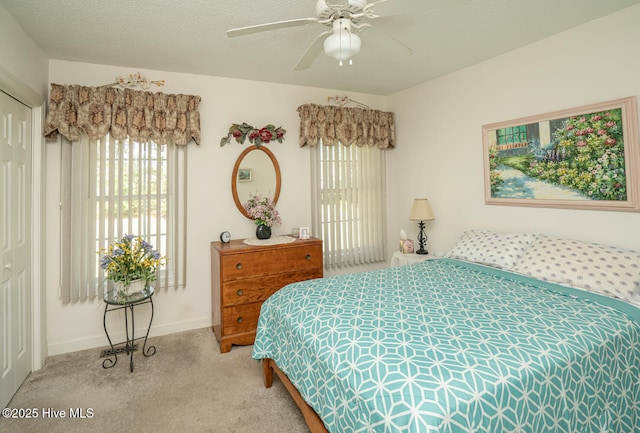 1071 Ridge Walk Way NW, Calabash, NC 28467 - bedroom featuring carpet flooring, multiple windows, baseboards, and ceiling fan