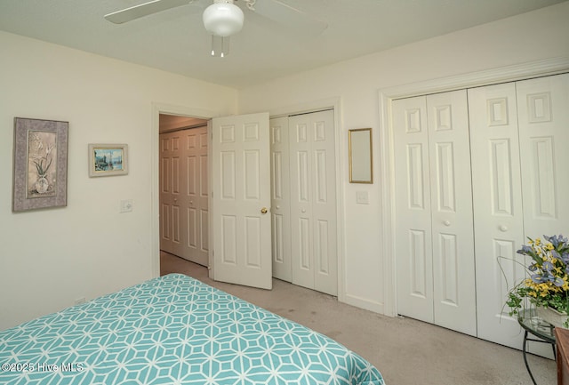 1071 Ridge Walk Way NW, Calabash, NC 28467 - carpeted bedroom with two closets and ceiling fan
