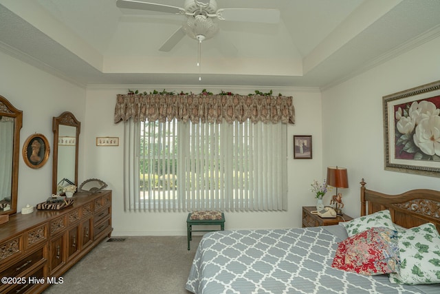 1071 Ridge Walk Way NW, Calabash, NC 28467 - carpeted bedroom featuring a ceiling fan, ornamental molding, and a tray ceiling