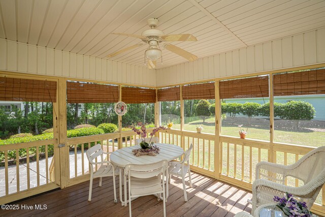 1071 Ridge Walk Way NW, Calabash, NC 28467 - sunroom with ceiling fan and outdoor dining space