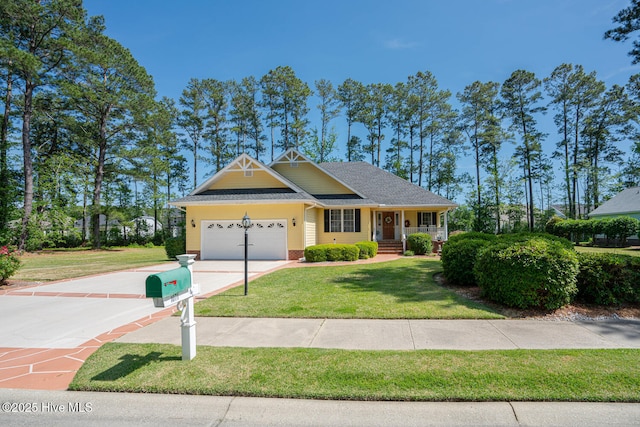 1071 Ridge Walk Way NW, Calabash, NC 28467 - view of front of house with brick siding, covered porch, a garage, concrete driveway, and a front lawn