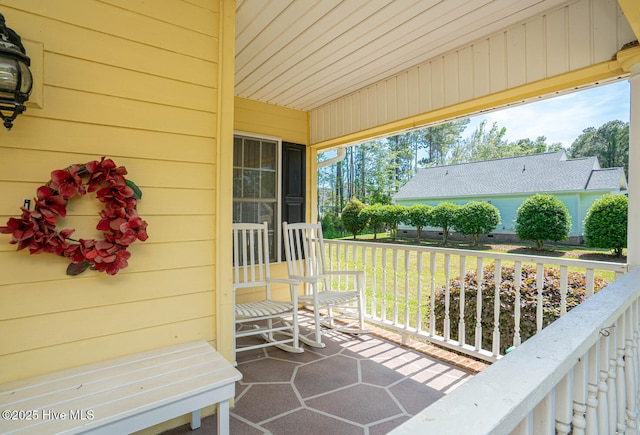 1071 Ridge Walk Way NW, Calabash, NC 28467 - balcony featuring a porch