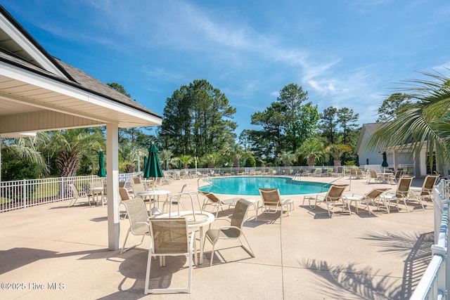 1071 Ridge Walk Way NW, Calabash, NC 28467 - community pool with a patio area and fence