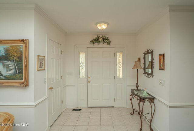1071 Ridge Walk Way NW, Calabash, NC 28467 - foyer entrance with crown molding, light tile patterned flooring, and visible vents