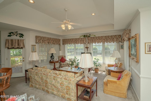 1071 Ridge Walk Way NW, Calabash, NC 28467 - carpeted living area featuring a tray ceiling, crown molding, a ceiling fan, and recessed lighting