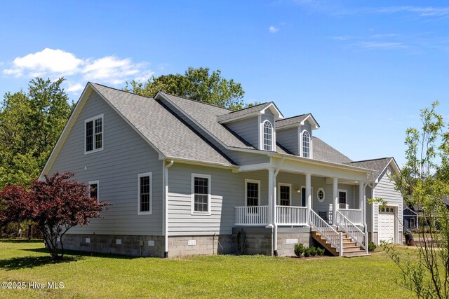 new england style home with roof with shingles, a porch, a front lawn, and crawl space