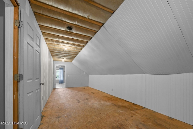additional living space with lofted ceiling