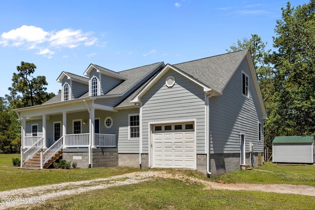 cape cod house with a porch, driveway, roof with shingles, a storage unit, and a front lawn