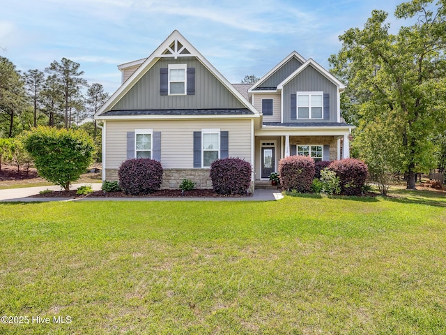 114 Schever Rd, West End, NC 27376 - craftsman inspired home featuring board and batten siding, stone siding, and a front lawn