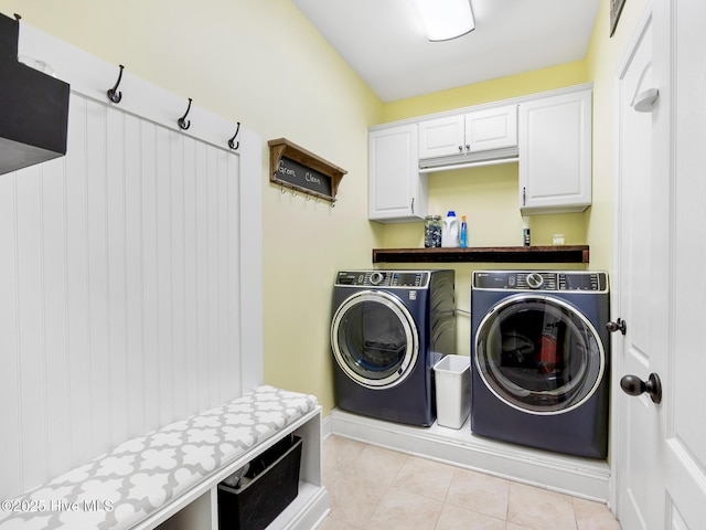 114 Schever Rd, West End, NC 27376 - laundry room with baseboards, cabinet space, light tile patterned floors, and washing machine and dryer