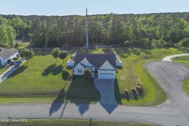 bird's eye view featuring a forest view