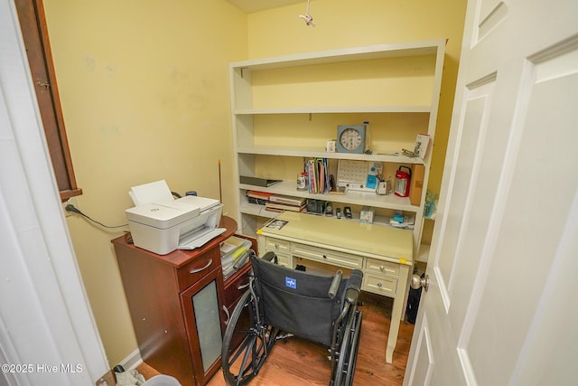 office space with wood finished floors