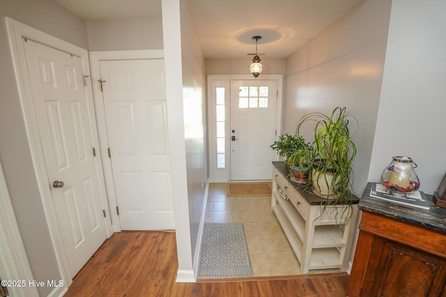 foyer with light tile patterned floors