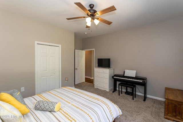 bedroom with a ceiling fan, baseboards, and carpet