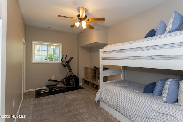 bedroom featuring baseboards, visible vents, ceiling fan, and carpet