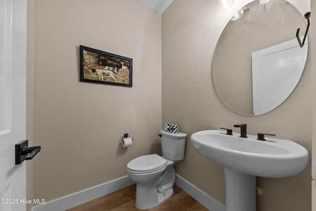 44 S Shamrock Dr, Foxfire Village, NC 27281 - half bathroom featuring baseboards, toilet, and wood finished floors