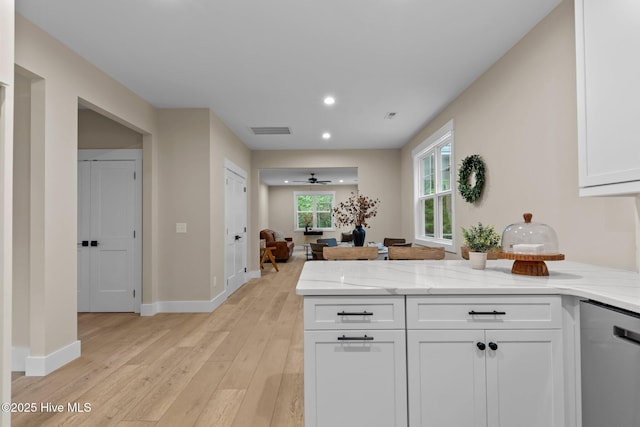 44 S Shamrock Dr, Foxfire Village, NC 27281 - kitchen featuring stainless steel dishwasher, a peninsula, white cabinets, recessed lighting, and light wood-style flooring