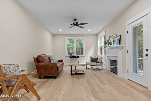 44 S Shamrock Dr, Foxfire Village, NC 27281 - living room featuring light wood finished floors, ceiling fan, a high end fireplace, recessed lighting, and baseboards