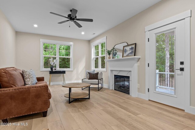 44 S Shamrock Dr, Foxfire Village, NC 27281 - living area featuring light wood-type flooring, a ceiling fan, a fireplace, baseboards, and recessed lighting