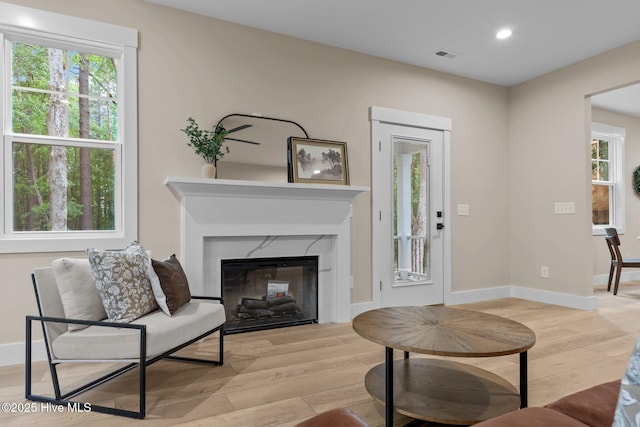 44 S Shamrock Dr, Foxfire Village, NC 27281 - living area with light wood finished floors, baseboards, recessed lighting, and a fireplace
