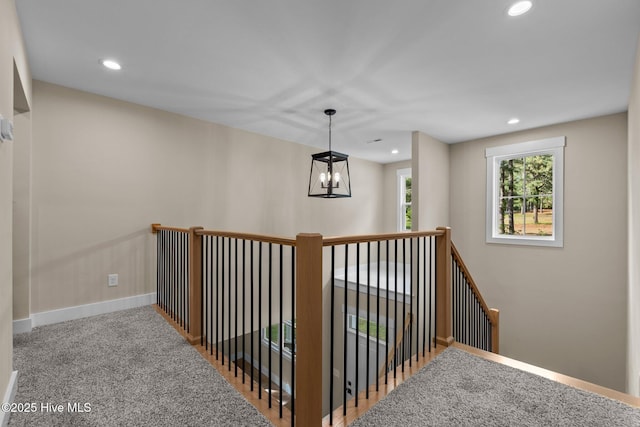 44 S Shamrock Dr, Foxfire Village, NC 27281 - corridor featuring an upstairs landing, a chandelier, recessed lighting, baseboards, and carpet flooring